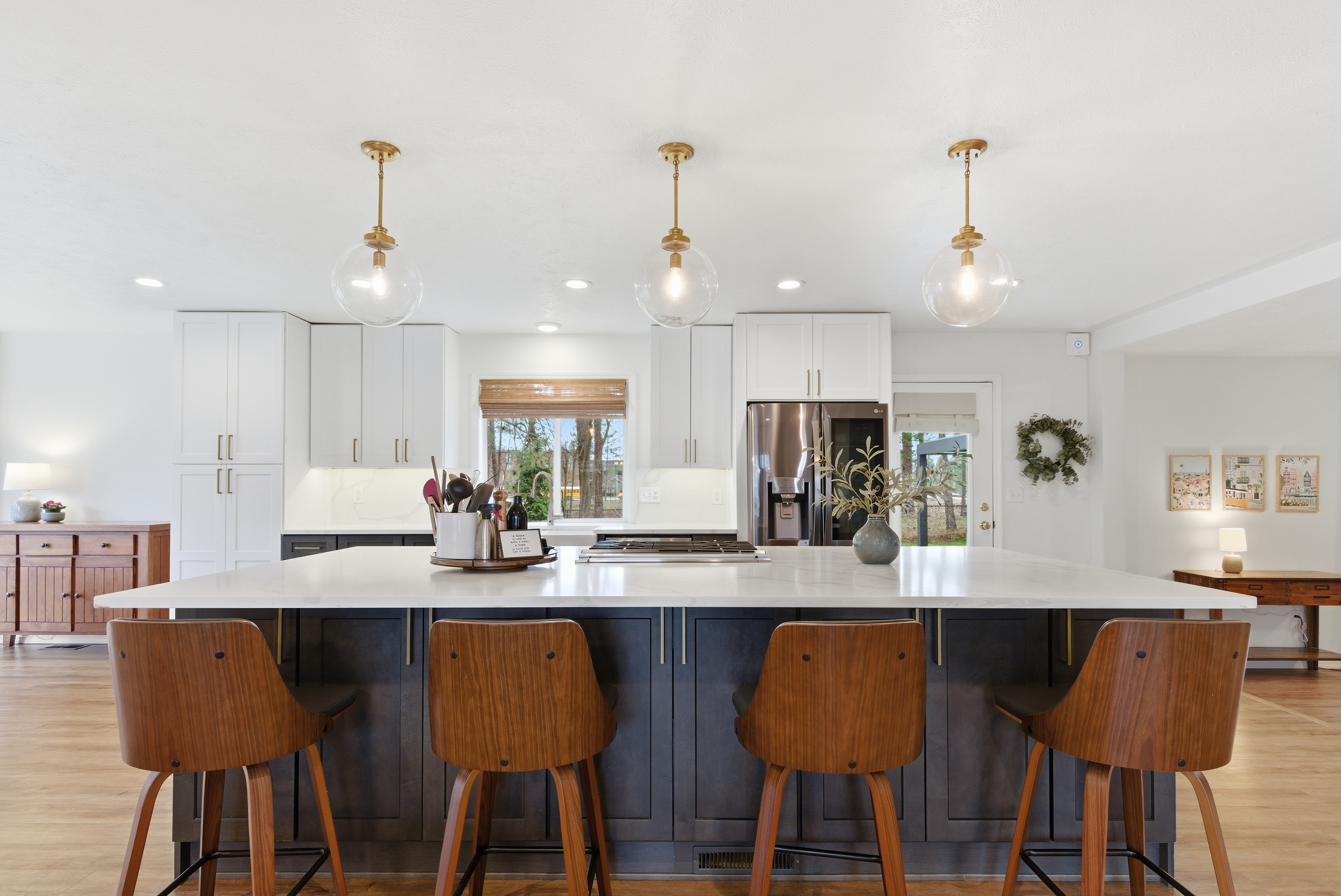 Kitchen with gold pendant lights